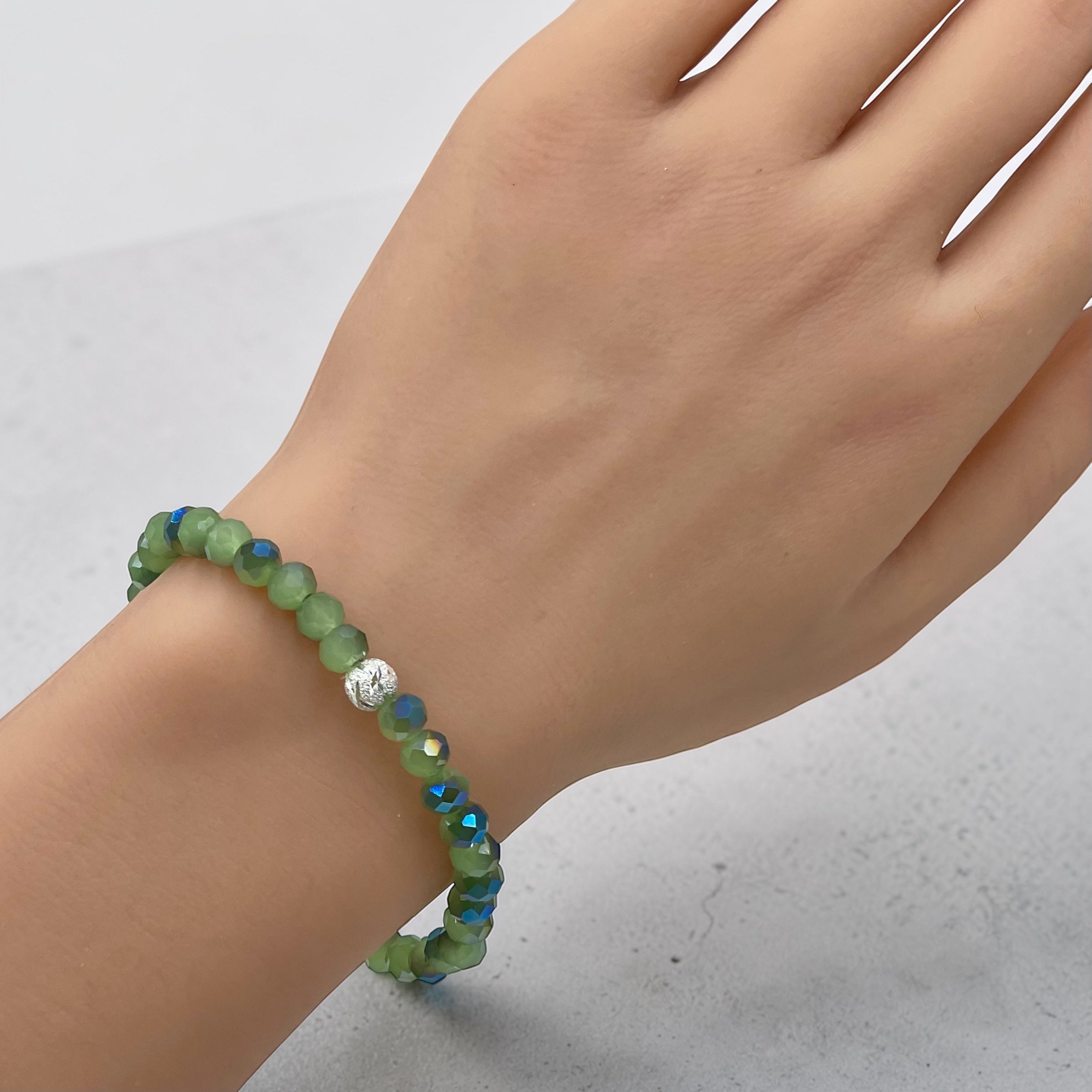 Faceted Rondelle Stretch Bracelet with Clover Charm